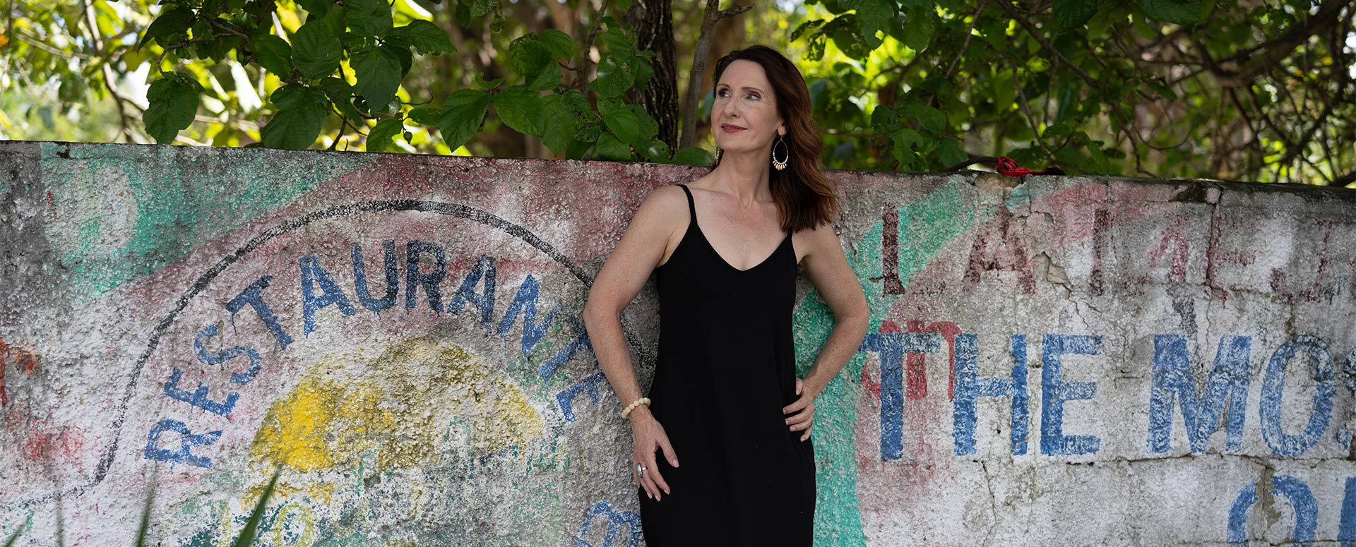 Rachael Jayne Groover leaning against a cement wall